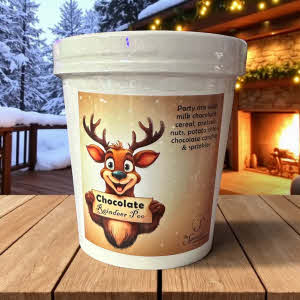 Reindeer Poo container on wooden countertop with snow and fireplace in the background