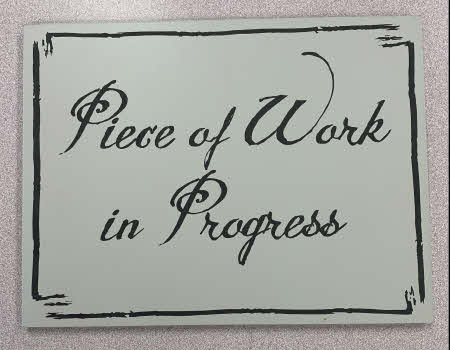 Piece of Work Sign